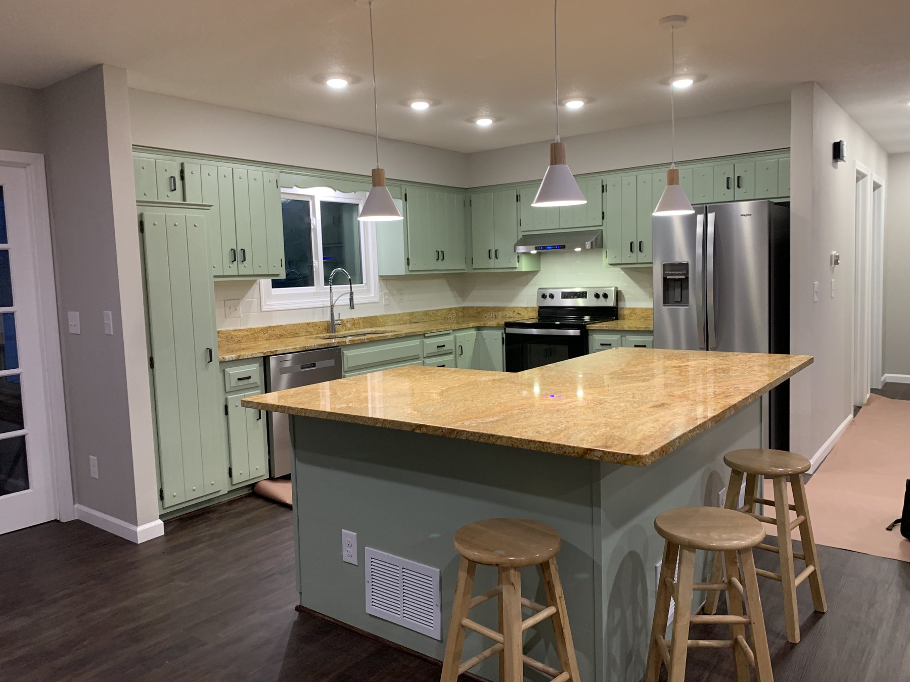 Finished residential kitchen lighting and electrical installation by Sona Electric LLC